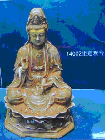 Bodhisattva Guanyin sitting above water lily